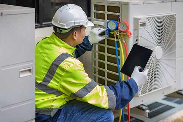 Professional Ductwork Repair technician working in Hampton, NY